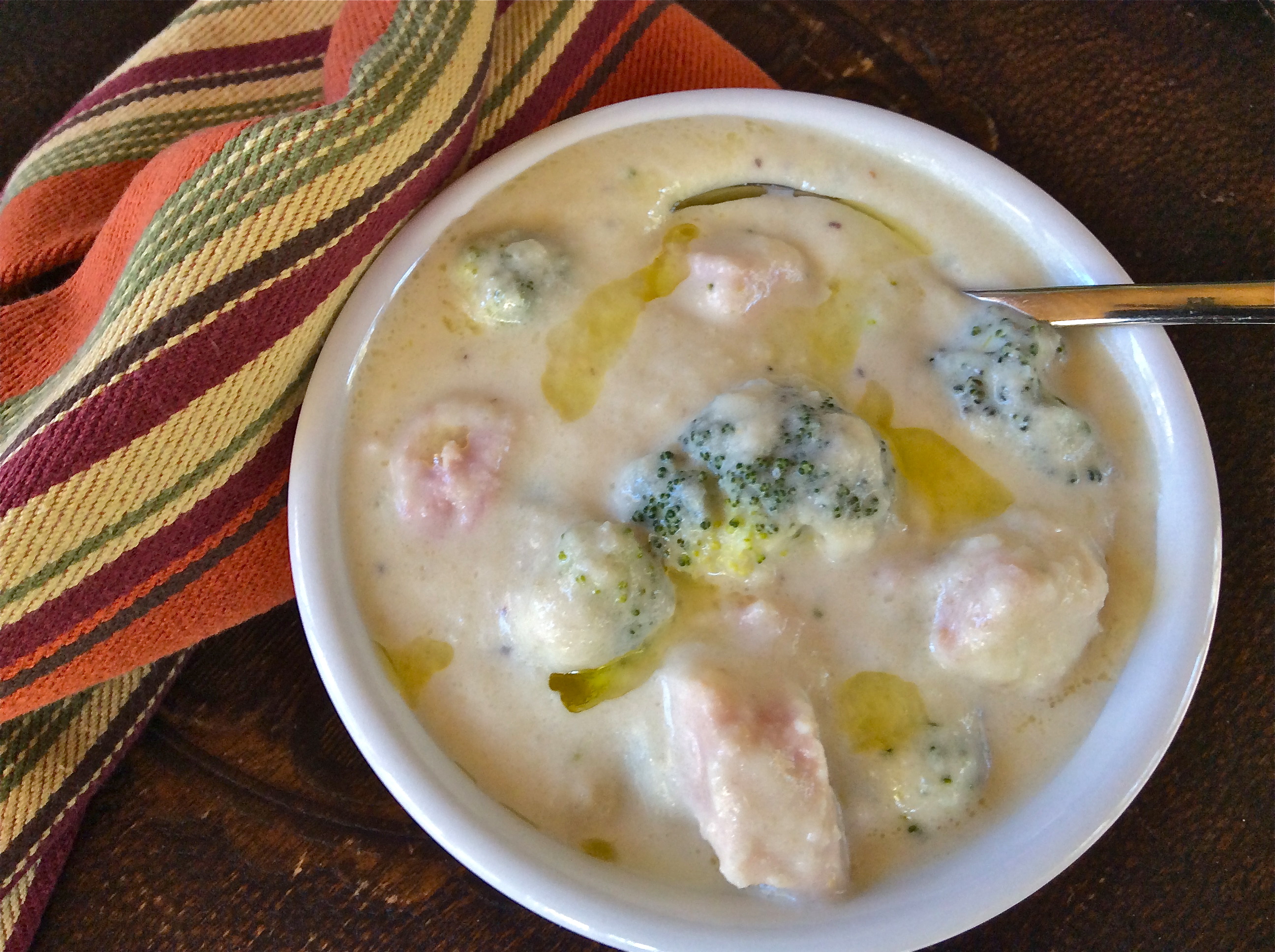 Creamy Cauliflower and Smoked Pork Chop Soup with Garlic-Infused Olive Oil